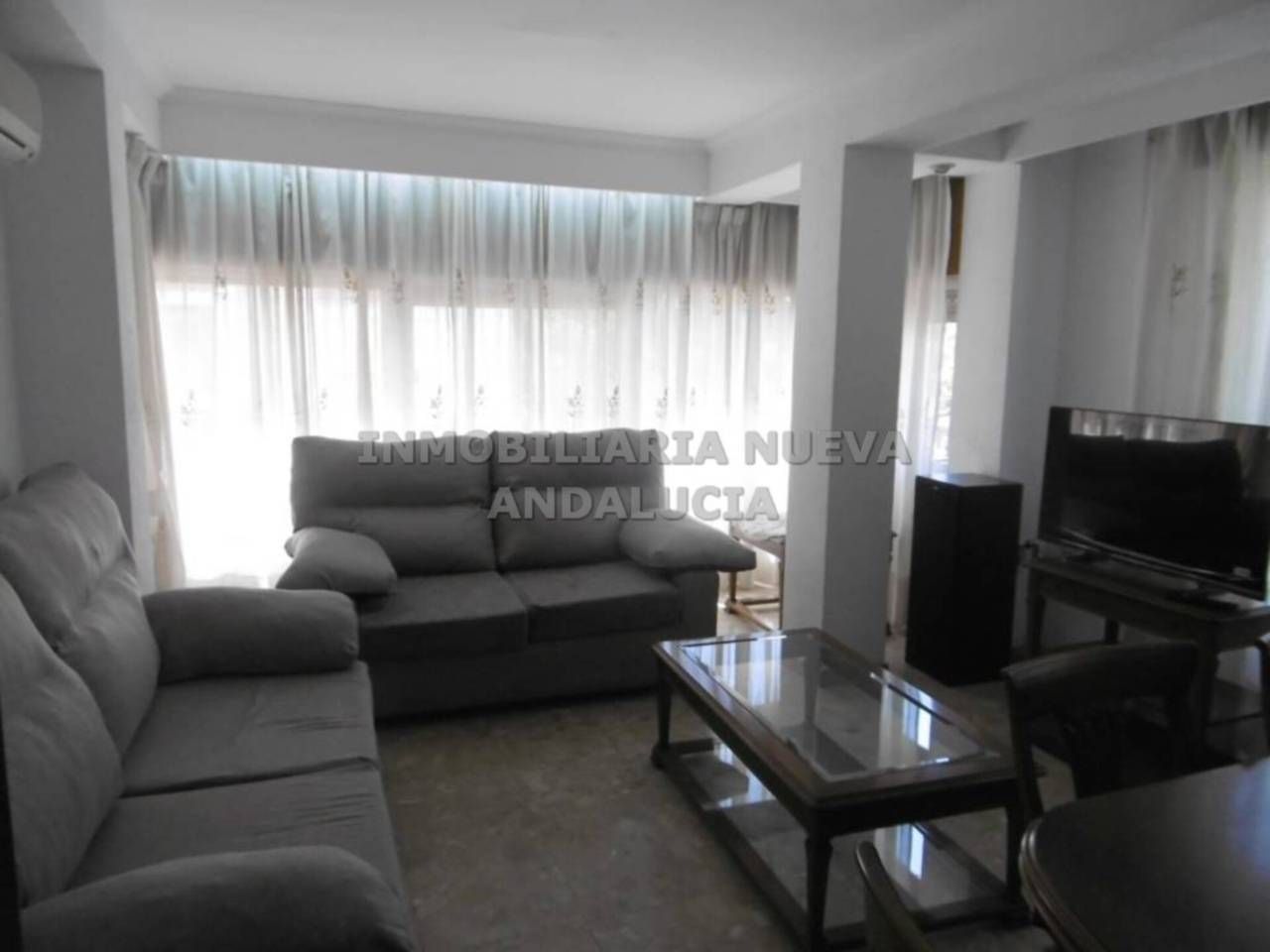 Sala d'estar de Pis de lloguer en  Almería Capital amb Aire condicionat i Moblat