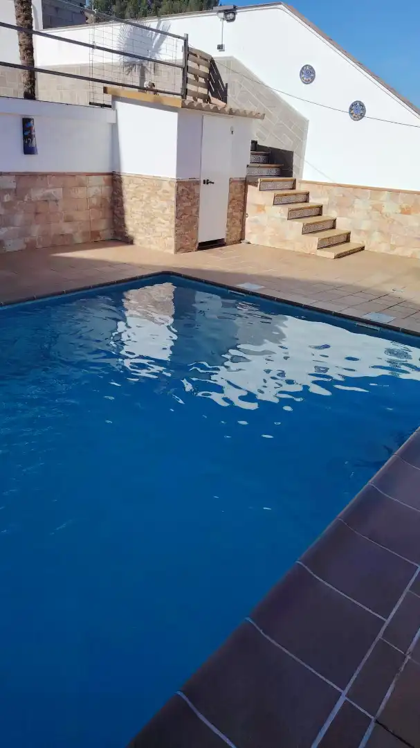 Piscina de Casa adosada en venda en Deifontes amb Calefacció, Jardí privat i Terrassa