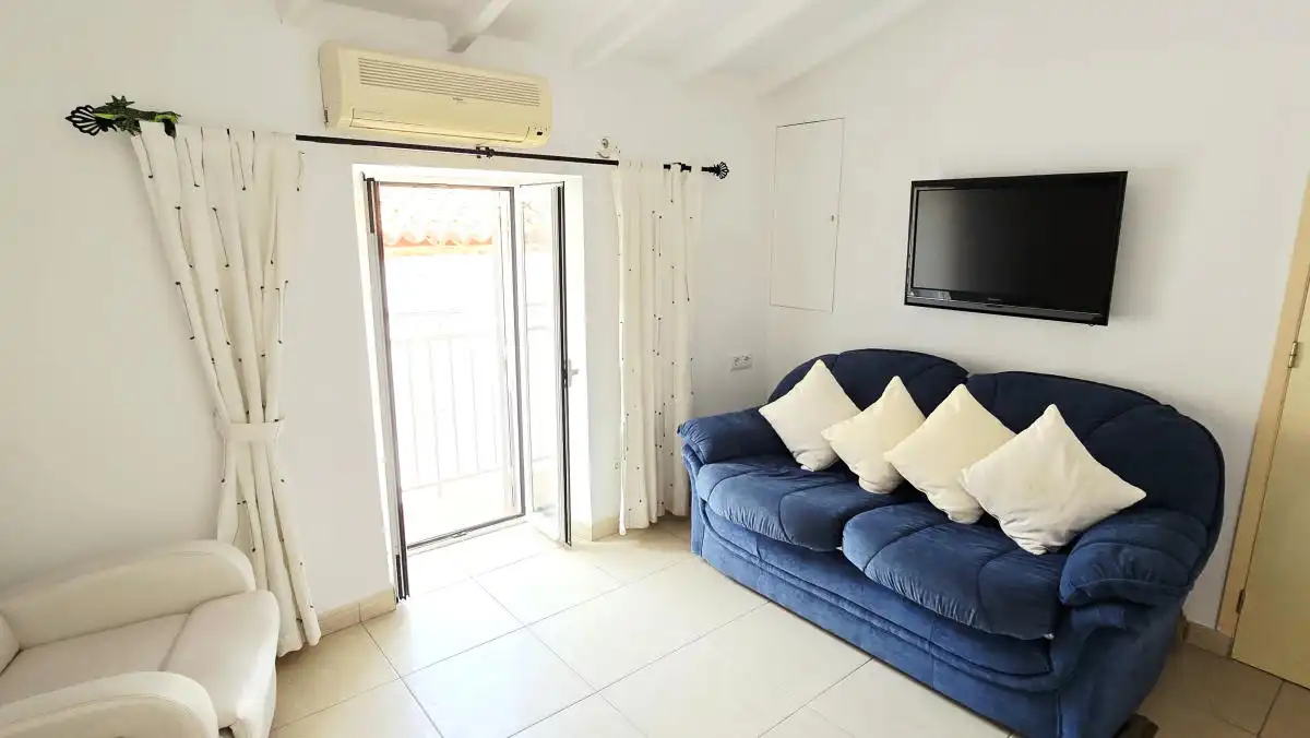 Sala de estar de Casa adosada en venta en Benamargosa con Aire acondicionado, Horno y Balcón