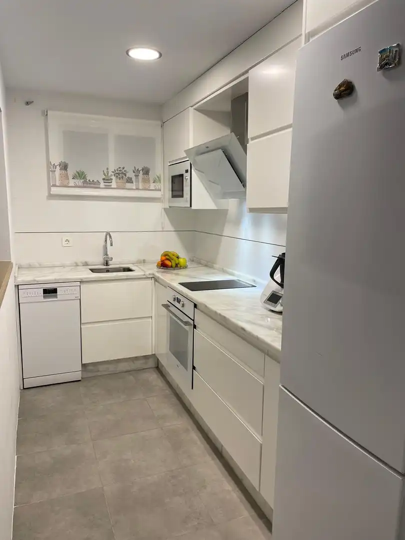 Kitchen of Flat for sale in El Portil  with Terrace, Furnished and Balcony