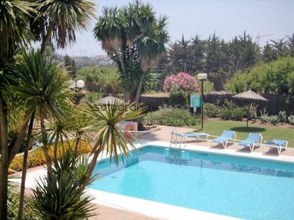 Swimming pool of Apartment for sale in Sotogrande  with Air Conditioner, Heating and Storage room