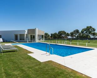 Swimming pool of Planta baja for sale in Sotogrande  with Air Conditioner, Heating and Private garden