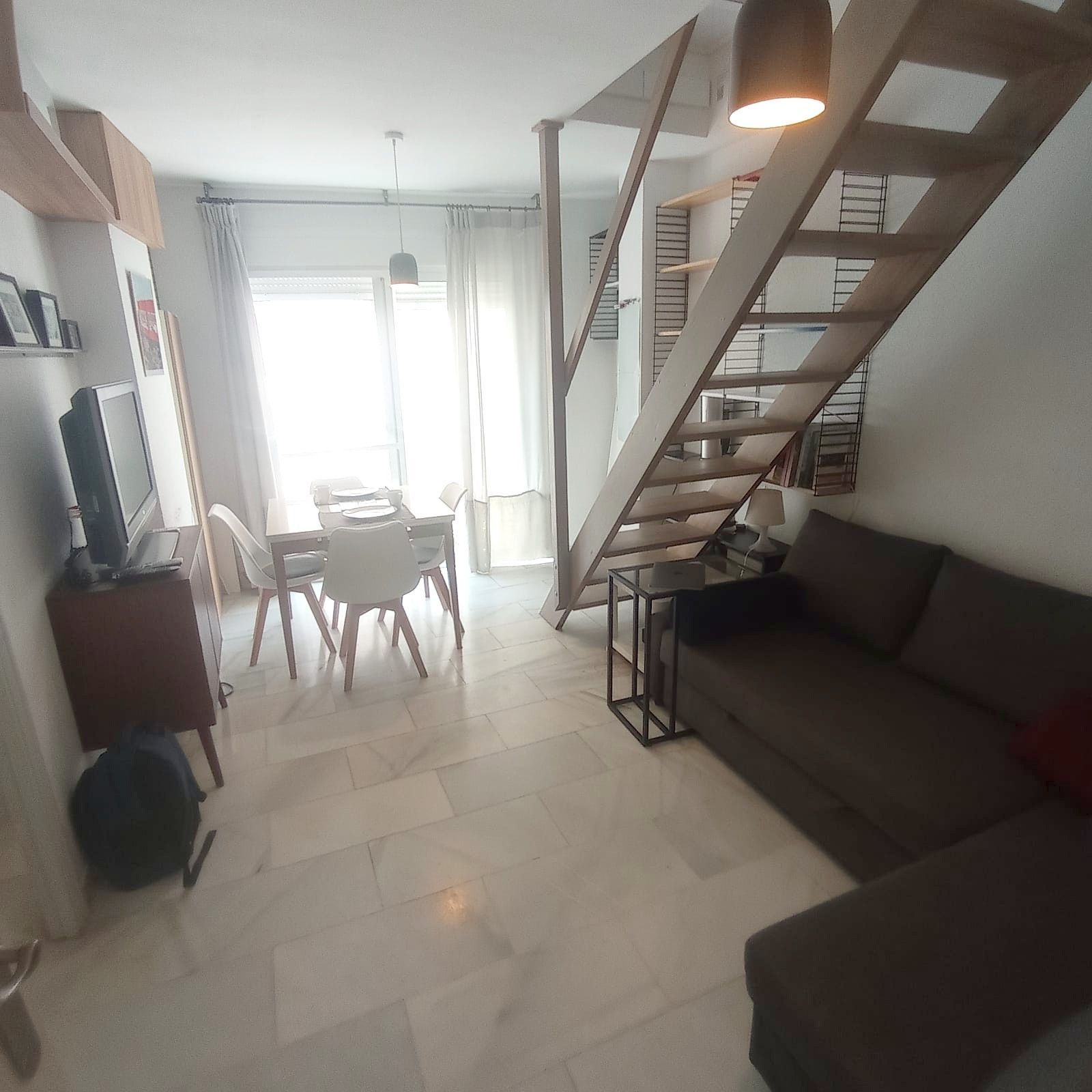 Sala d'estar de Dúplex en venda en Málaga Capital amb Aire condicionat, Terrassa i Moblat