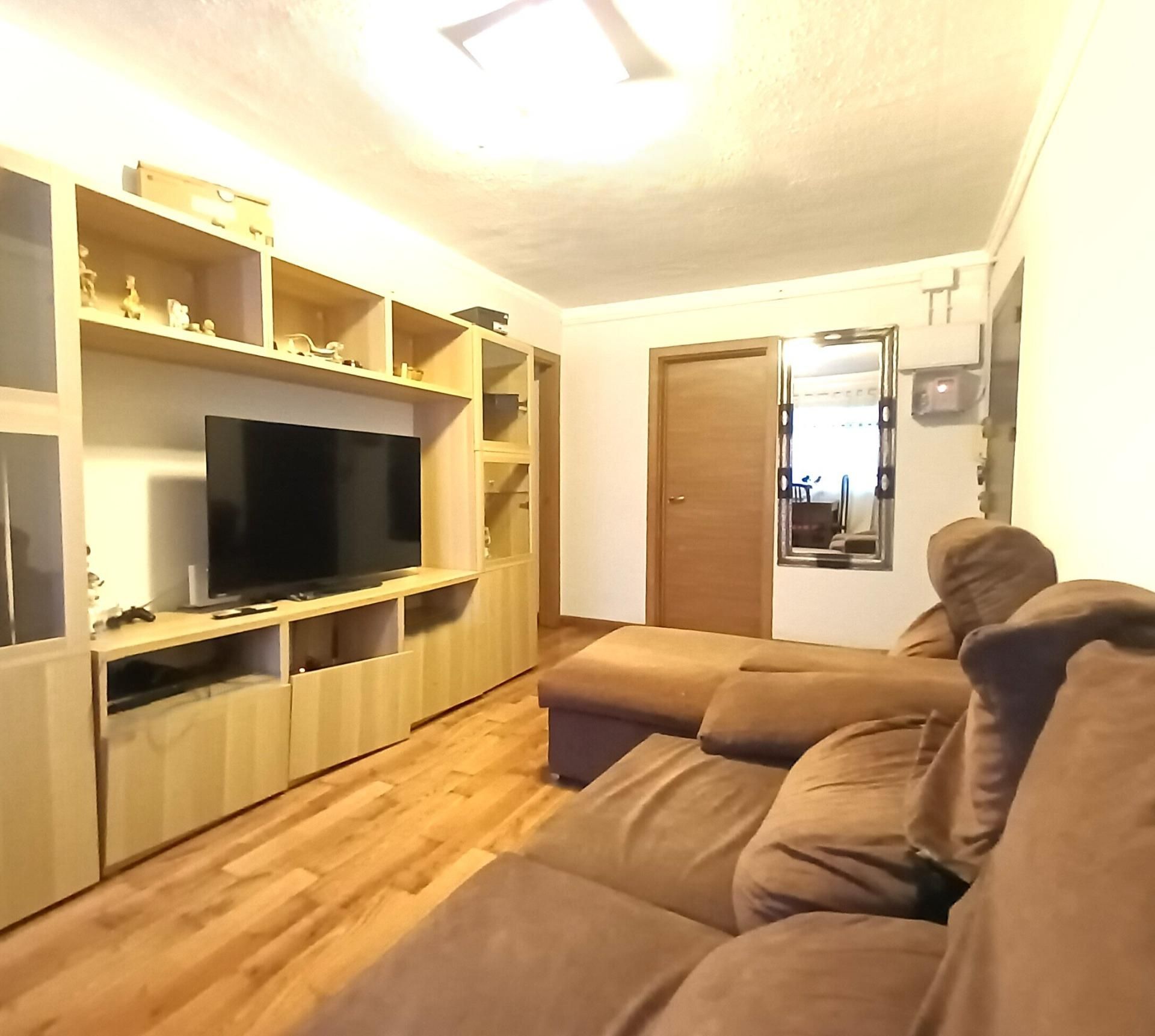 Living room of Flat for sale in Sabadell  with Air Conditioner and Parquet flooring
