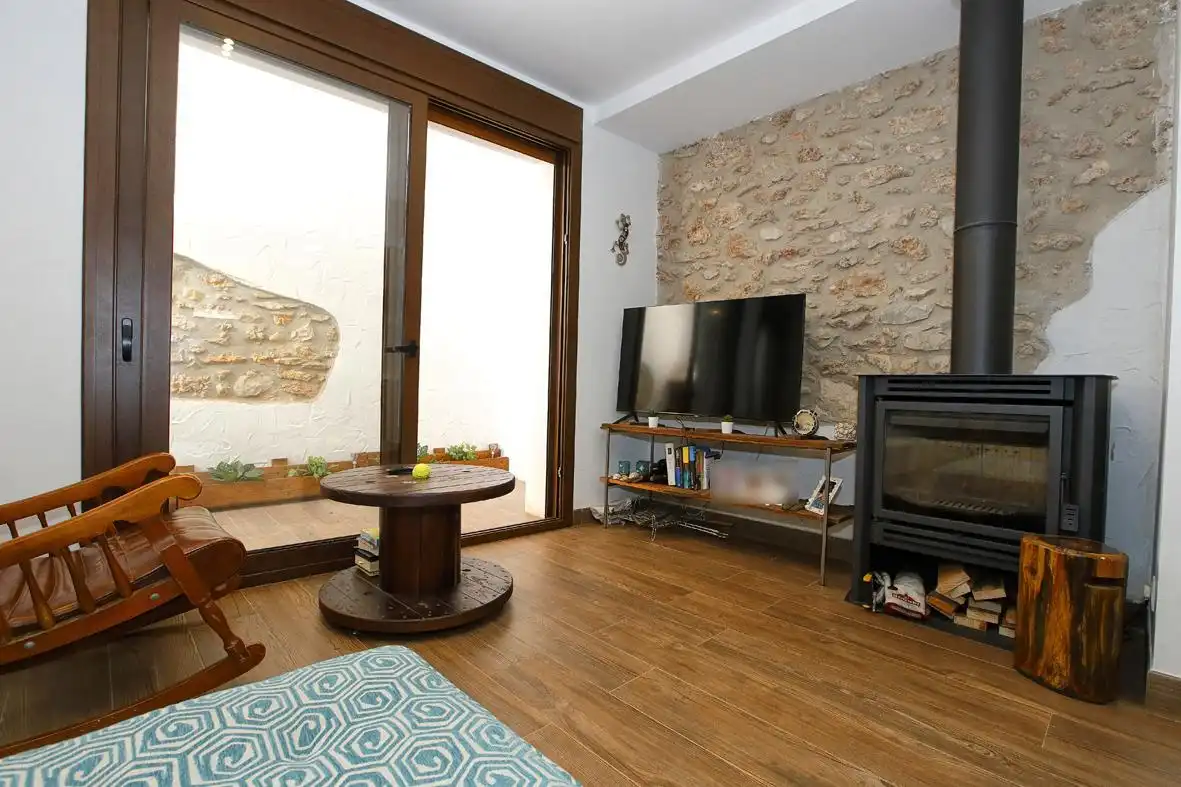 Sala de estar de Casa adosada en venta en Alcanar con Calefacción, Jardín privado y Terraza