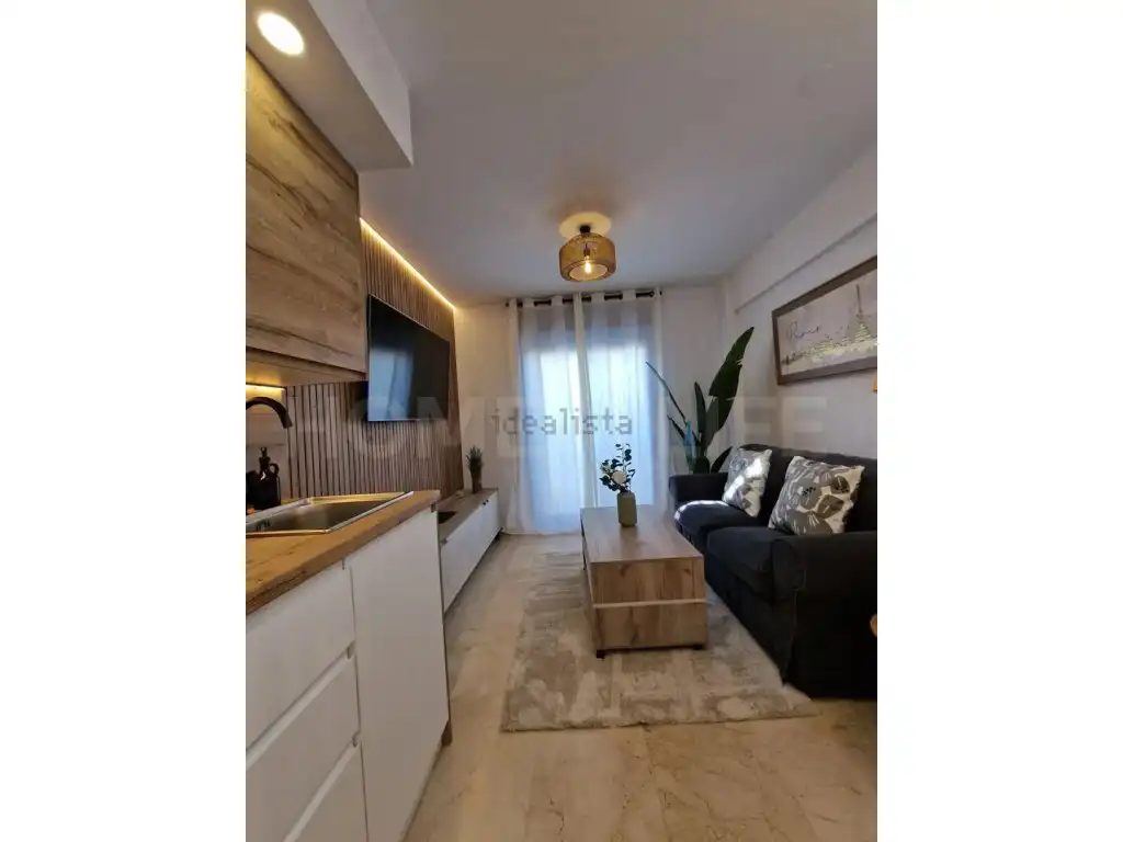 Wohnzimmer von Maisonette zum Verkauf in Benalmádena mit Klimaanlage, Privatgarten und Terrasse