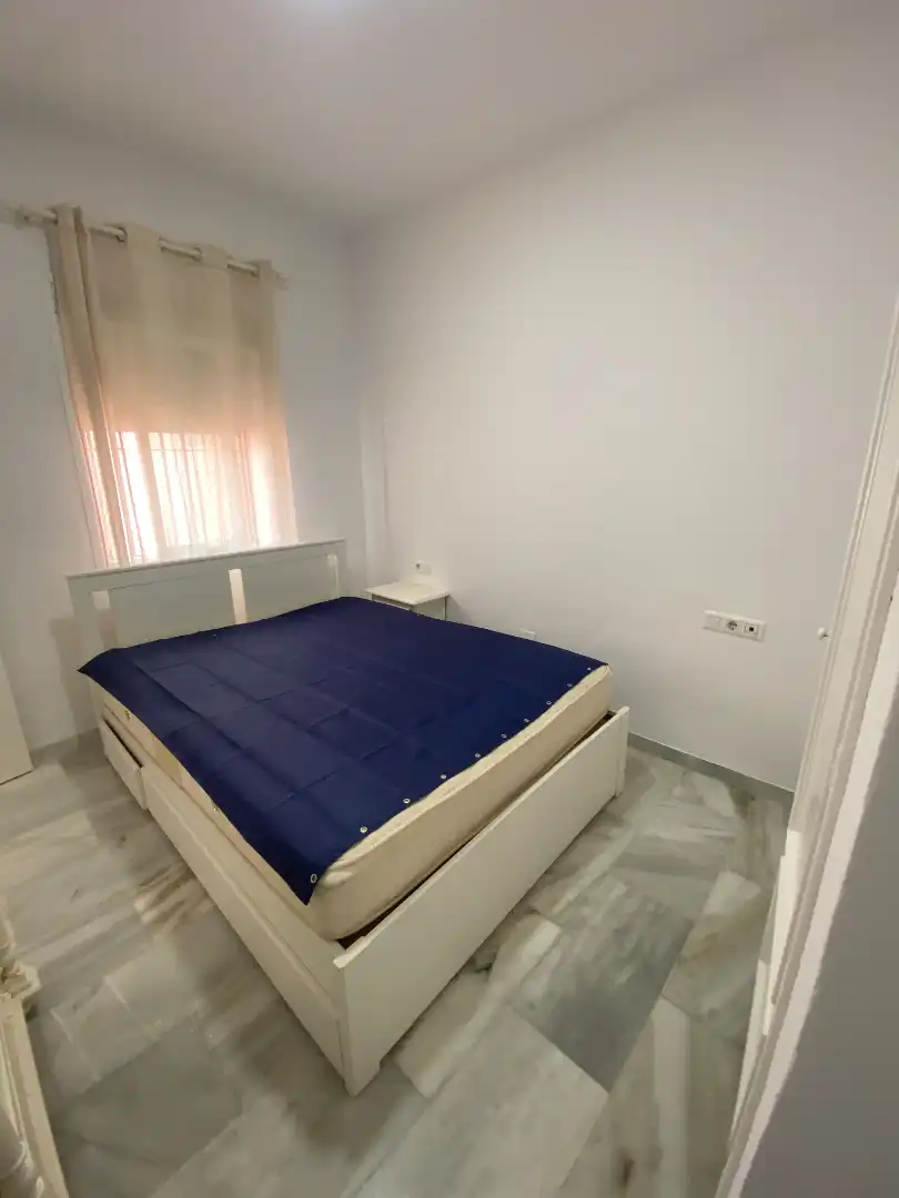 Dormitori de Apartament de lloguer en Málaga amb Aire condicionat, Moblat i Rentadora