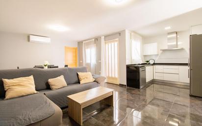 Sala d'estar de Casa adosada en venda en Massamagrell amb Aire condicionat i Terrassa