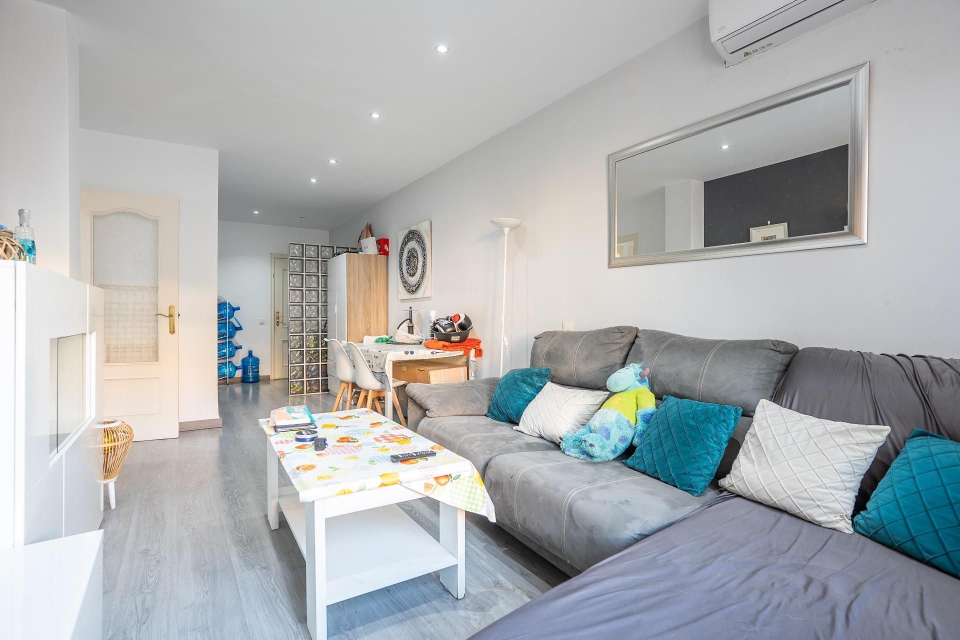 Sala de estar de Piso en venta en Huércal de Almería con Aire acondicionado, Parquet y Piscina comunitaria