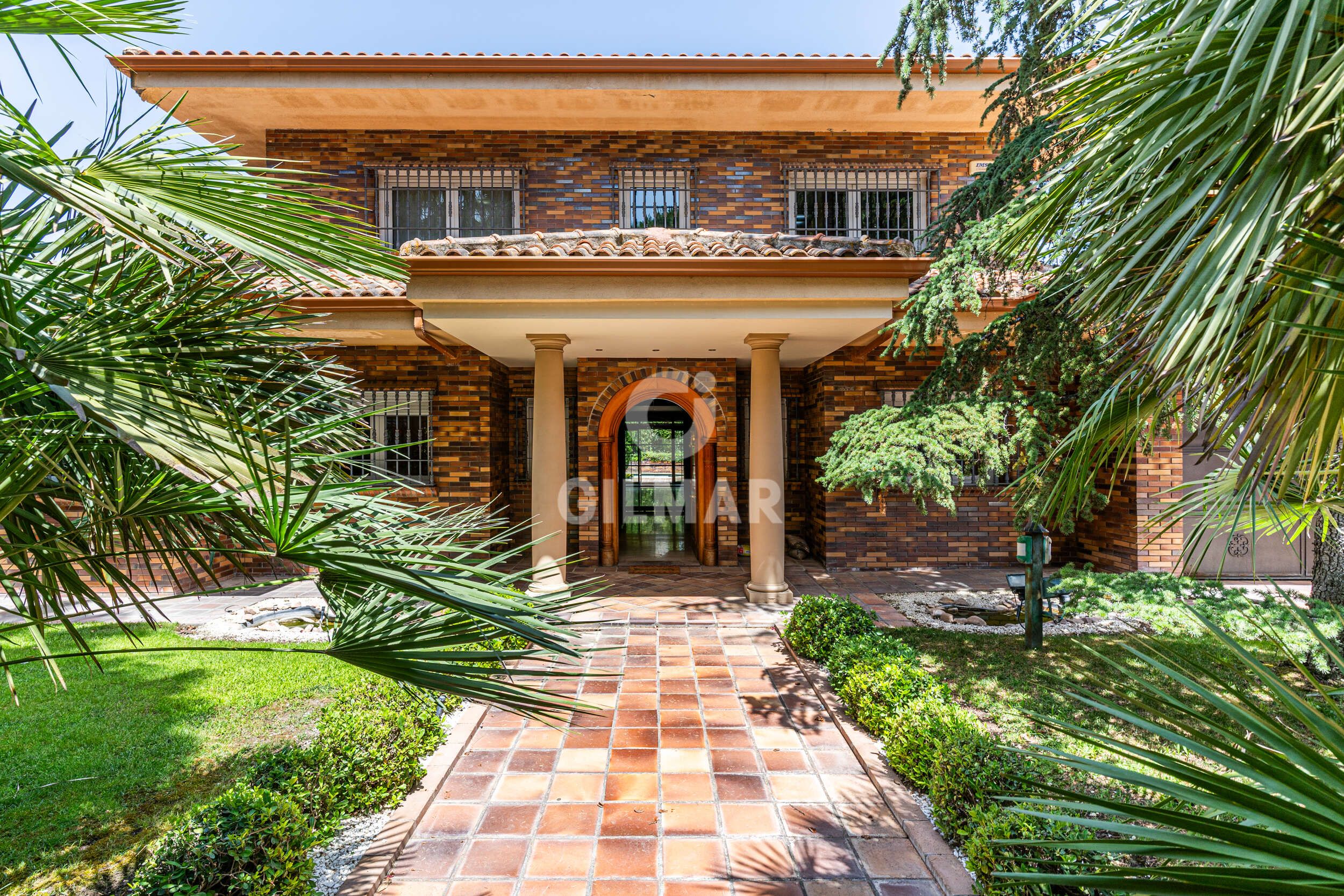 Exterior view of House or chalet for sale in Villaviciosa de Odón  with Heating, Private garden and Swimming Pool