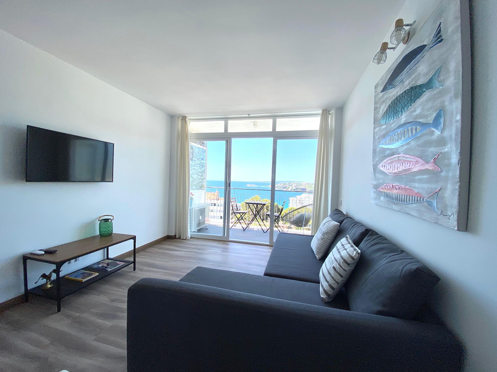 Sala d'estar de Apartament de lloguer en  Palma de Mallorca amb Balcó