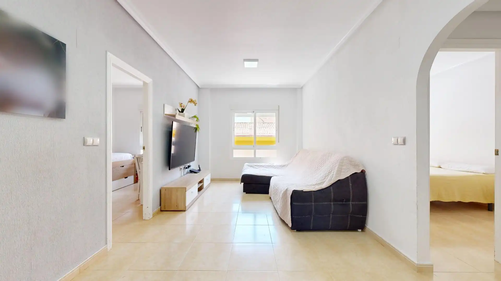 Sala d'estar de Apartament en venda en Los Montesinos amb Aire condicionat, Moblat i Piscina comunitària