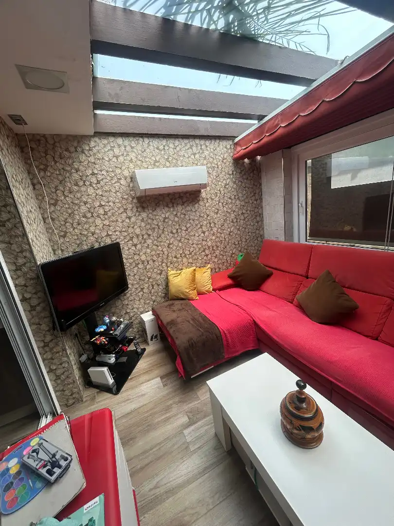 Wohnzimmer von Einfamilien-Reihenhaus zum Verkauf in Alhaurín de la Torre mit Klimaanlage, Privatgarten und Terrasse