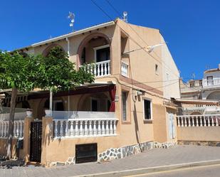 Exterior view of Single-family semi-detached for sale in Pilar de la Horadada  with Air Conditioner, Terrace and Balcony