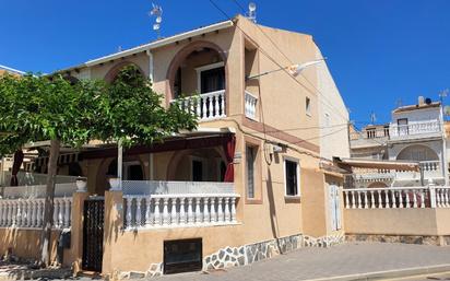 Exterior view of Single-family semi-detached for sale in Pilar de la Horadada  with Air Conditioner, Terrace and Balcony