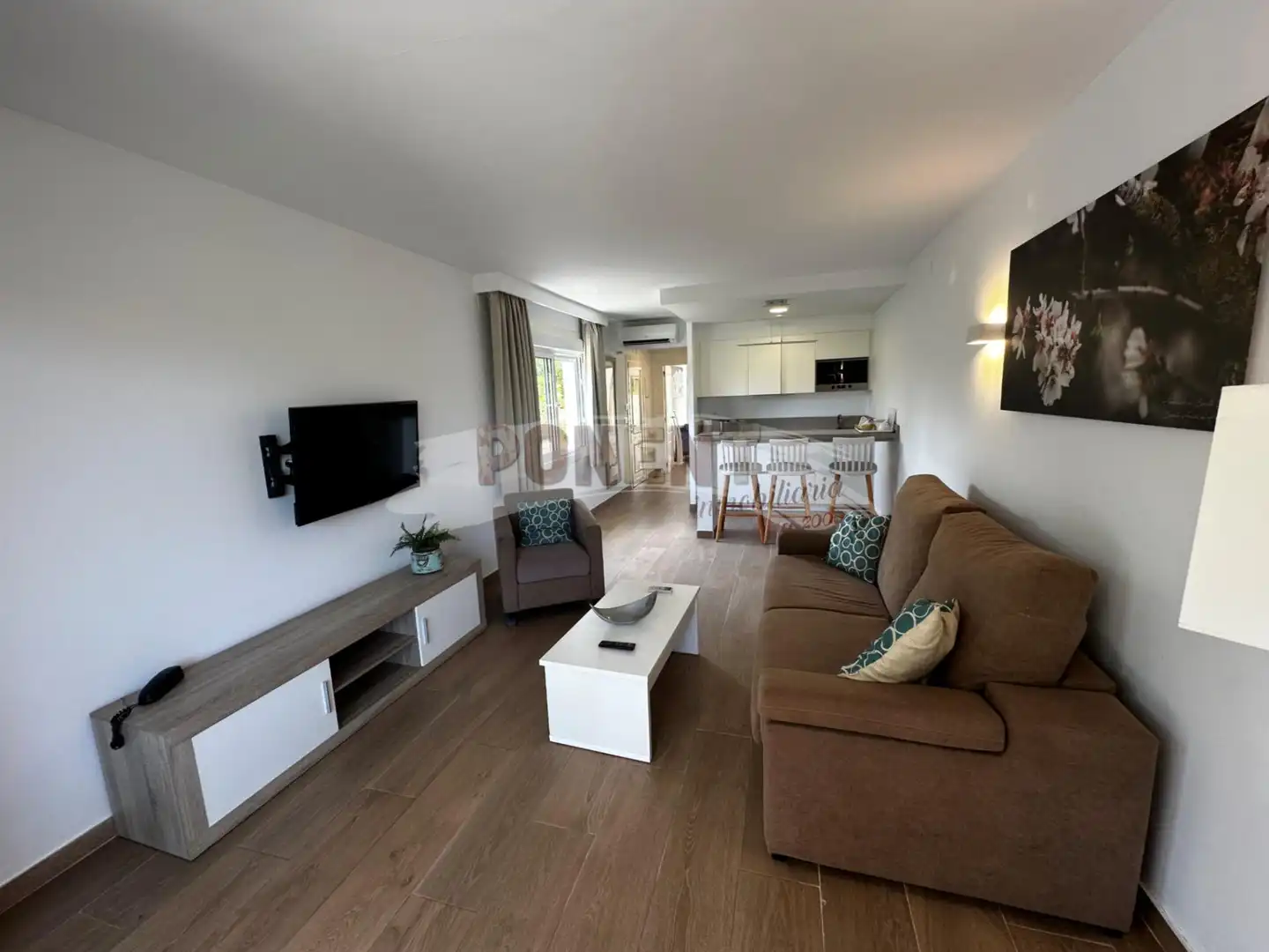 Sala d'estar de Apartament en venda en Sant Josep de sa Talaia amb Aire condicionat, Terrassa i Moblat