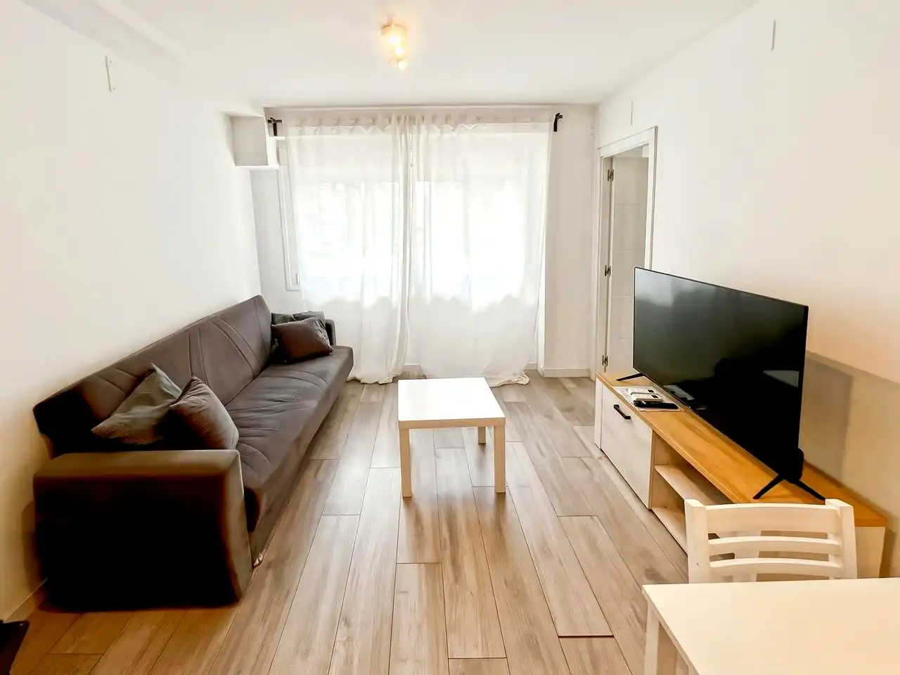 Sala d'estar de Apartament en venda en Alcobendas amb Aire condicionat i Moblat