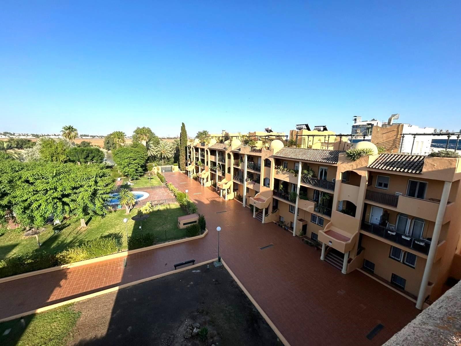 Terrace of Flat for sale in San Juan de Aznalfarache  with Air Conditioner, Private garden and Community pool