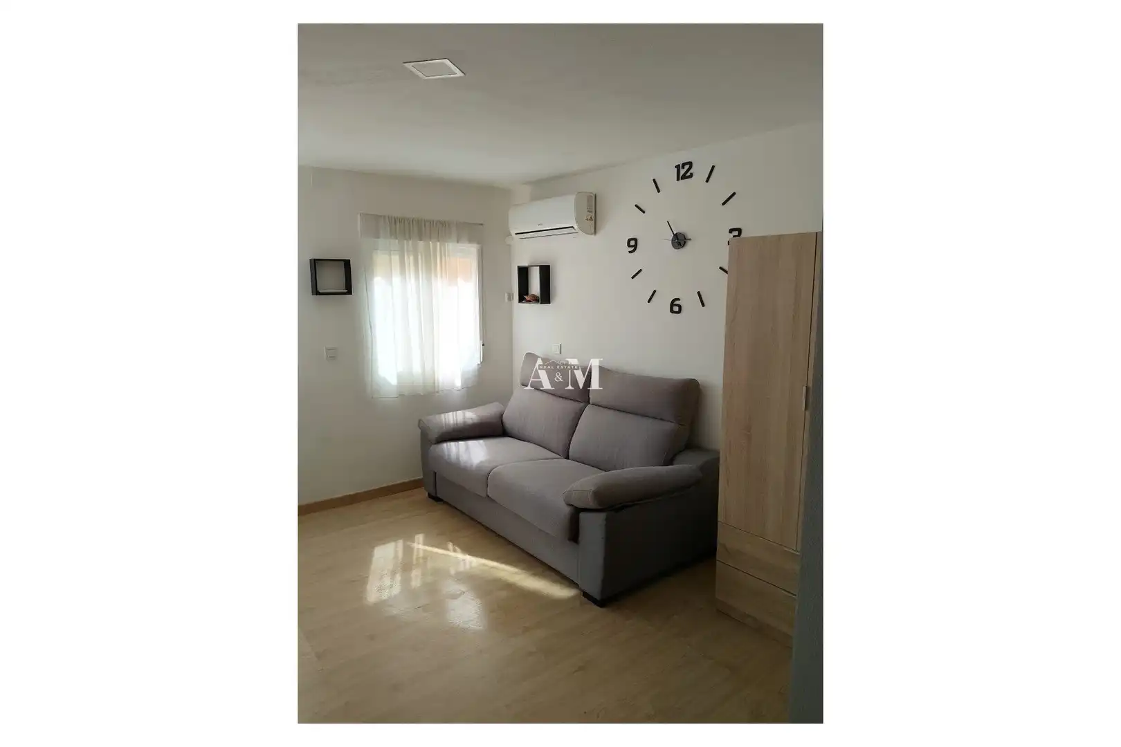Sala d'estar de Estudi de lloguer en Playa del Cura