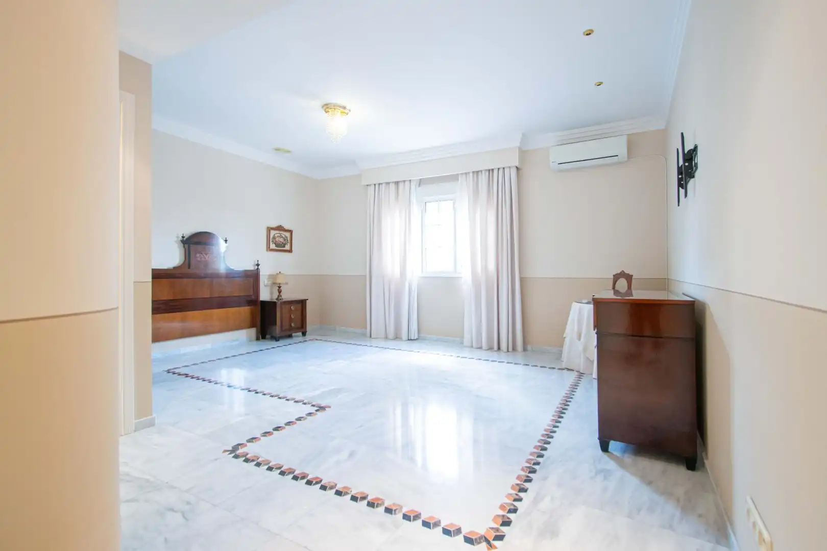 Sala d'estar de Casa adosada en venda en Utrera