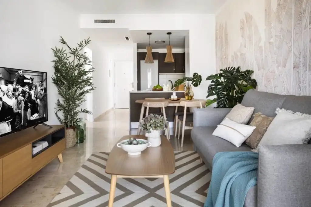 Sala d'estar de Apartament en venda en Manilva amb Aire condicionat, Jardí privat i Terrassa