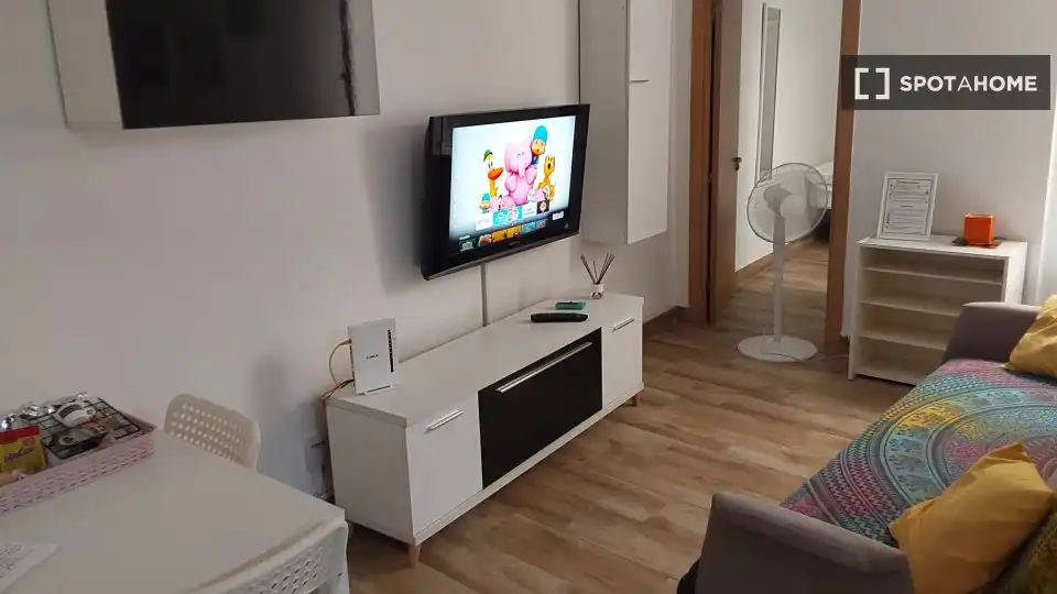 Sala d'estar de Pis per a compartir en Almería amb Aire condicionat, Terrassa i Moblat