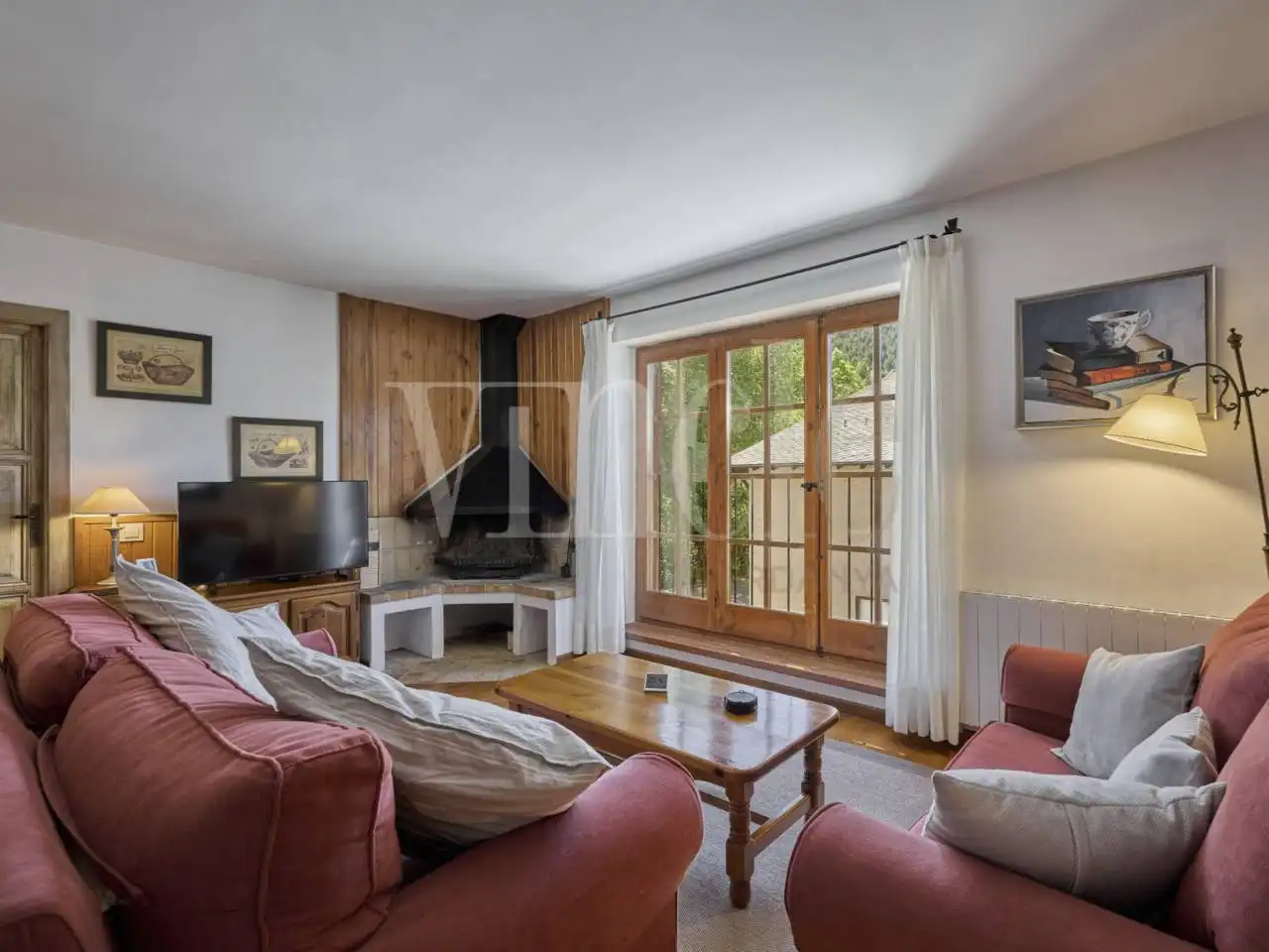 Sala de estar de Casa adosada en venta en Urús con Parquet y Terraza