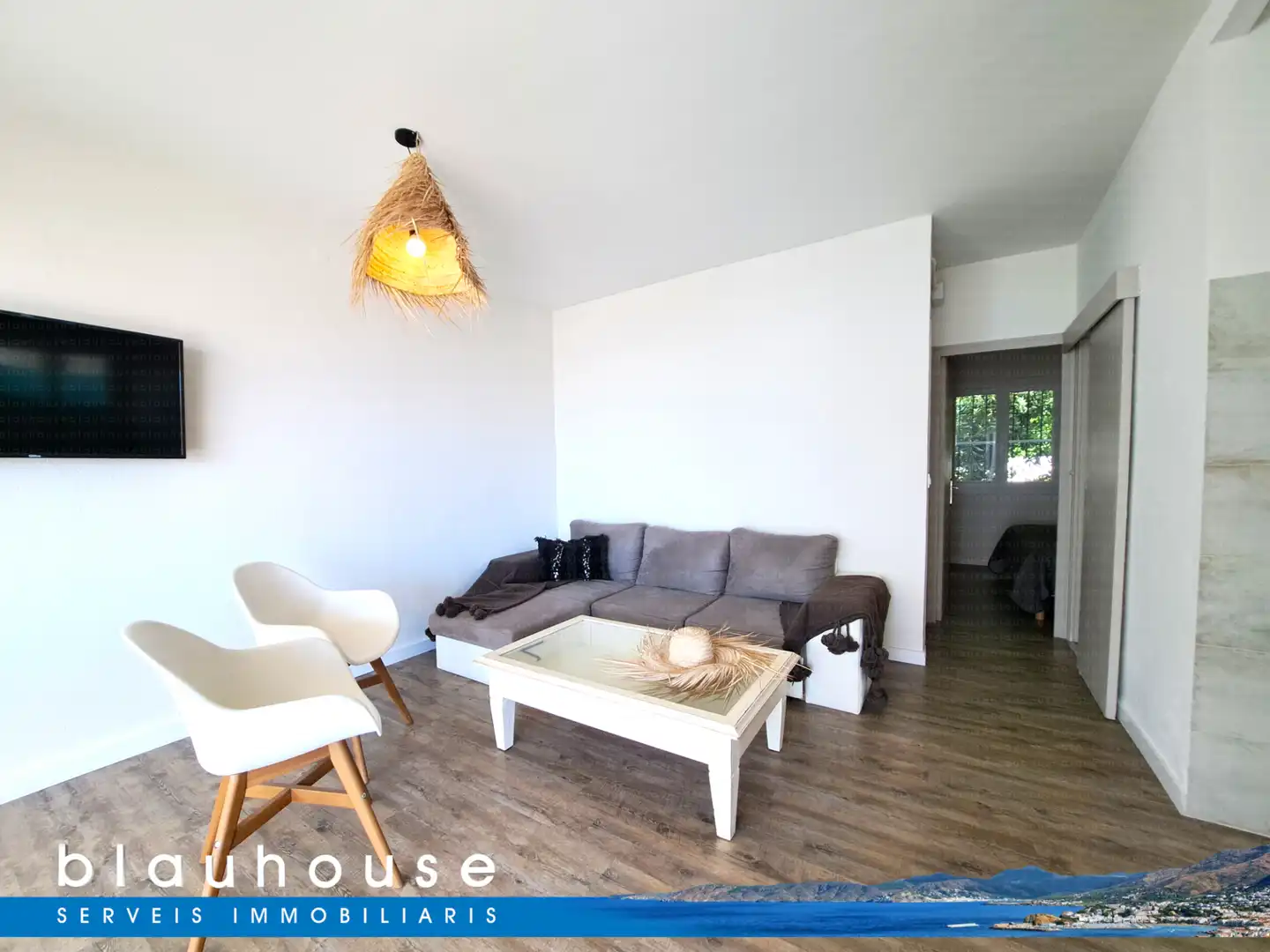 Sala d'estar de Casa adosada en venda en Llançà amb Jardí privat, Parquet i Terrassa