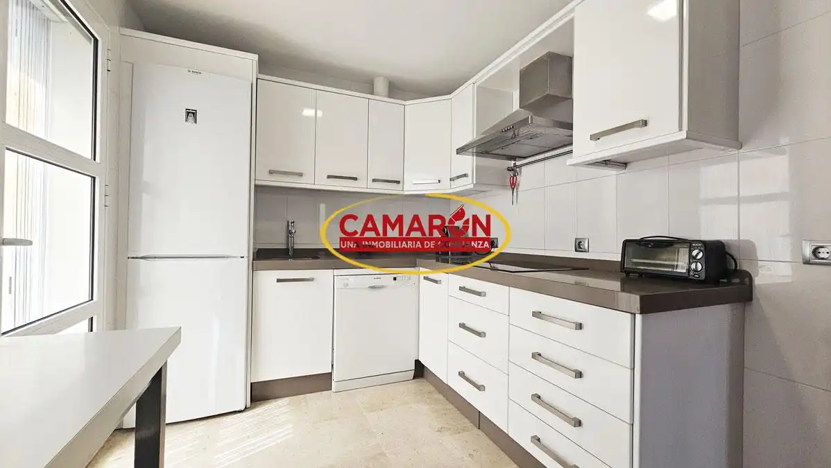 Cocina de Casa adosada en venta en La Puebla del Río con Trastero y Amueblado