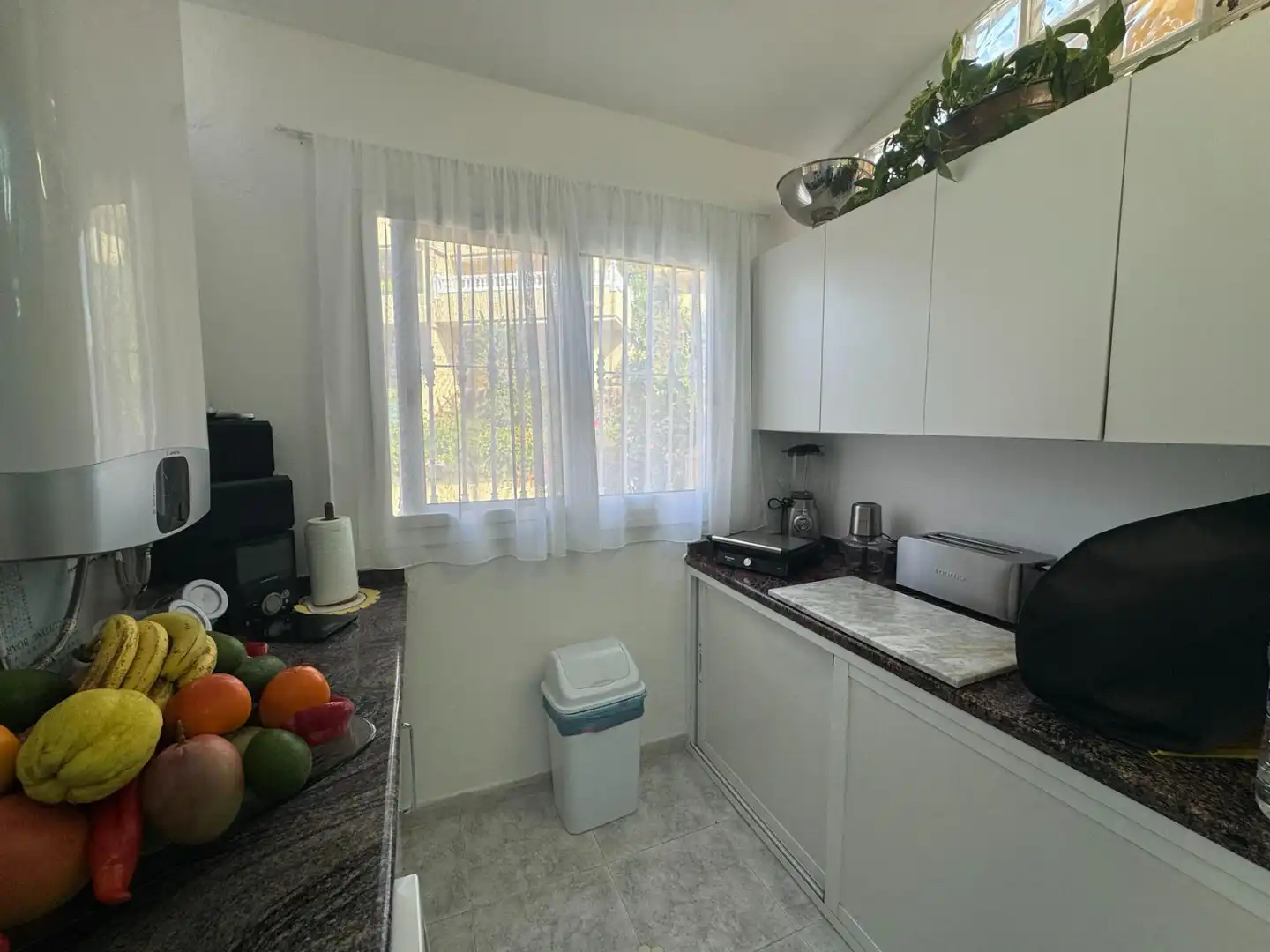 Cocina de Casa adosada en venta en Rincón de la Victoria con Aire acondicionado, Calefacción y Jardín privado