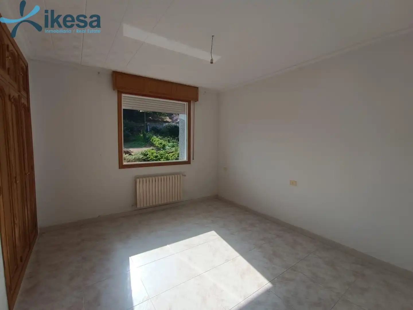 Dormitori de Casa o xalet en venda en Entrimo amb Jardí privat