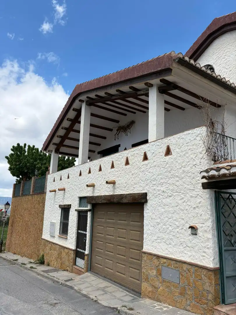 Vista exterior de Casa o xalet en venda en Nigüelas amb Jardí privat i Piscina comunitària