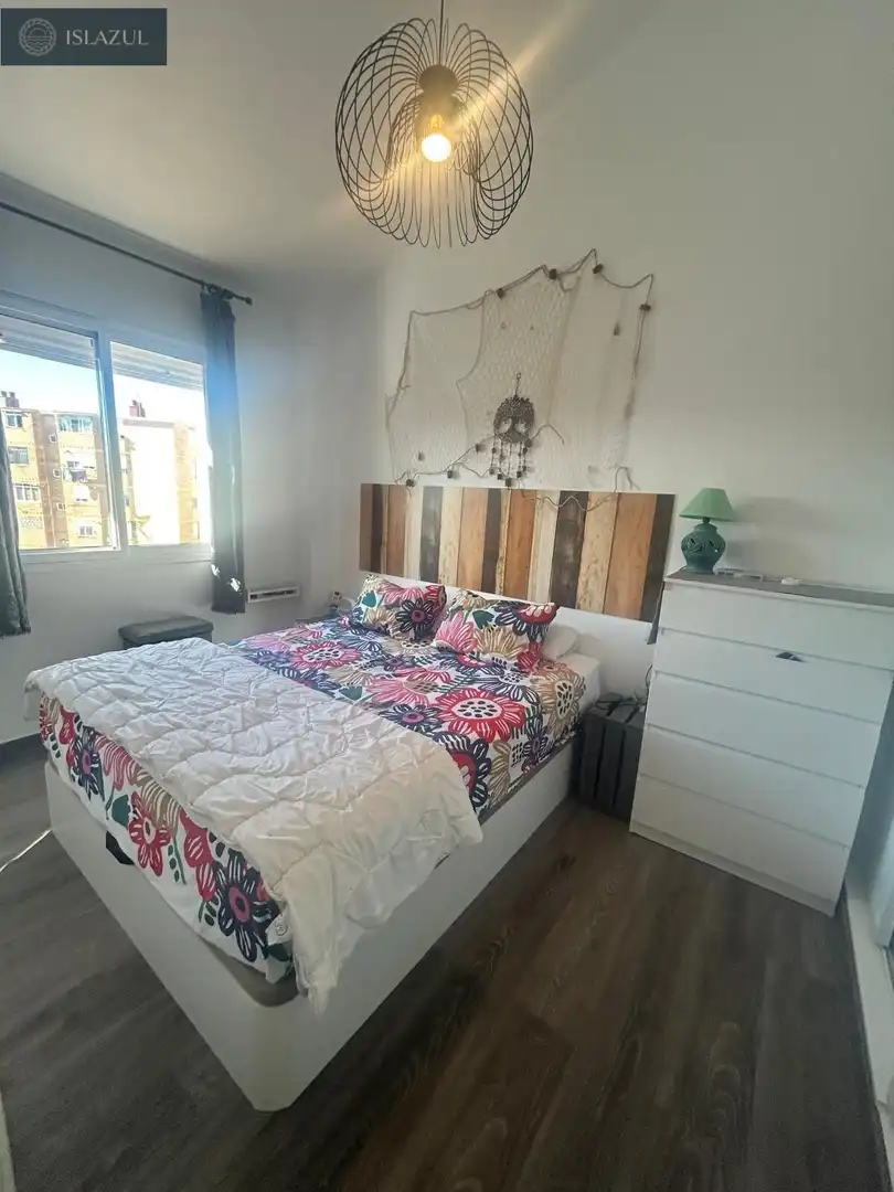Dormitori de Apartament en venda en Isla Cristina amb Aire condicionat, Jardí privat i Terrassa