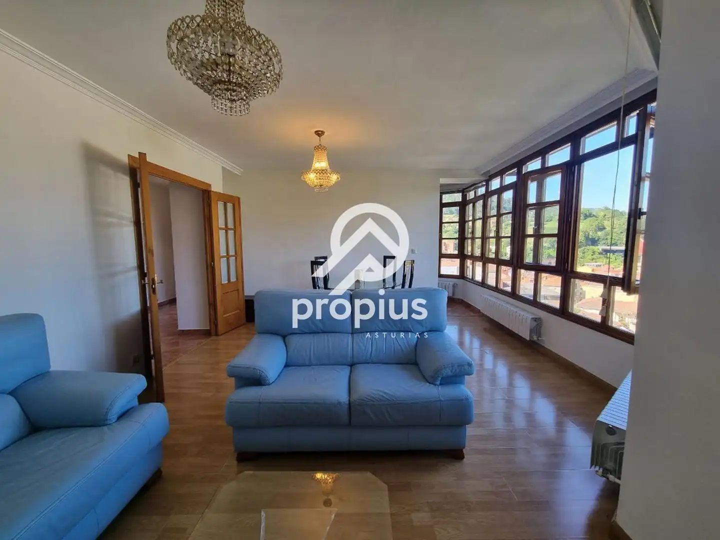 Sala de estar de Casa adosada en venta en Piloña con Calefacción, Jardín privado y Parquet