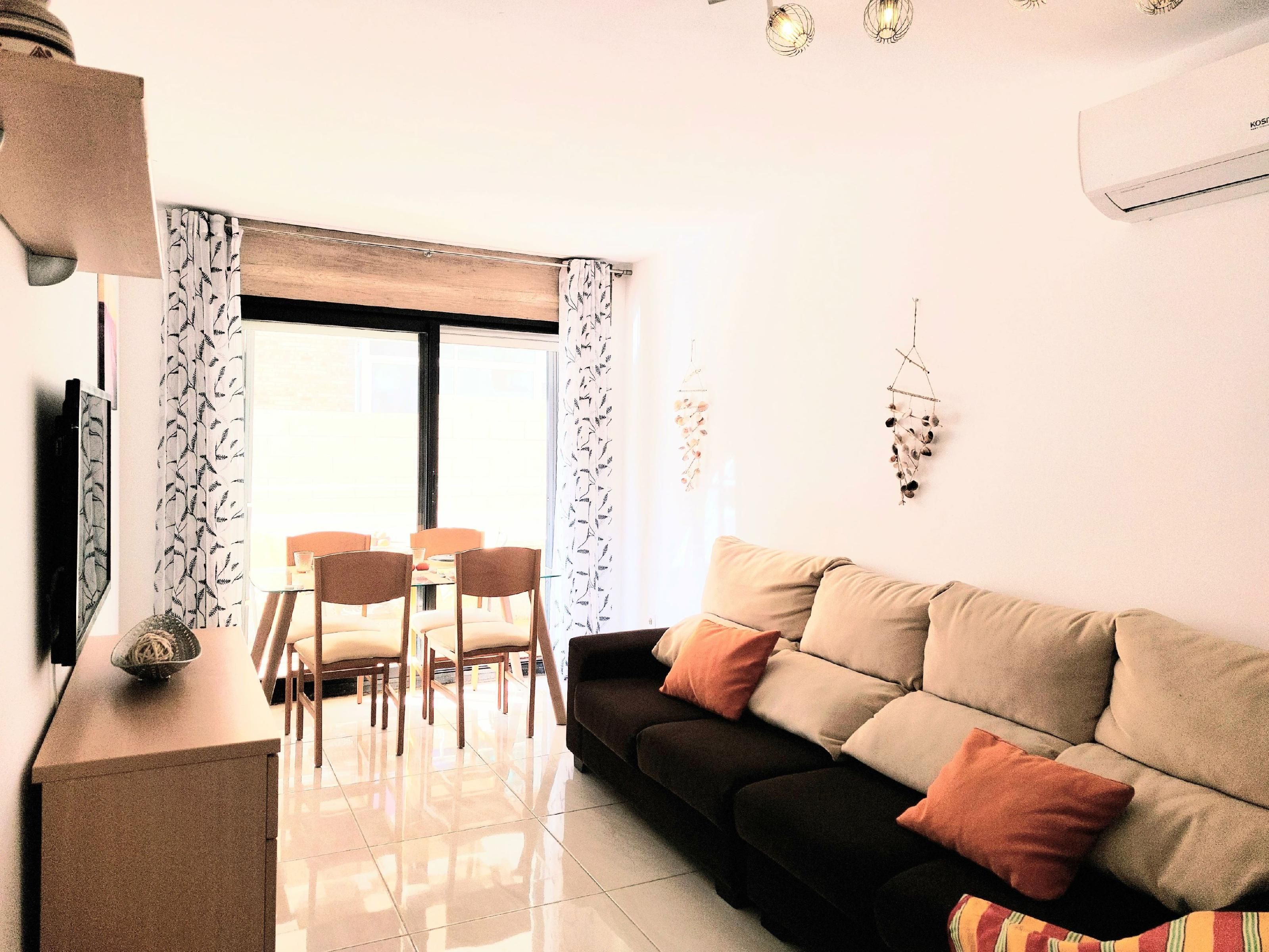 Living room of Planta baja for sale in Salou  with Air Conditioner, Heating and Terrace