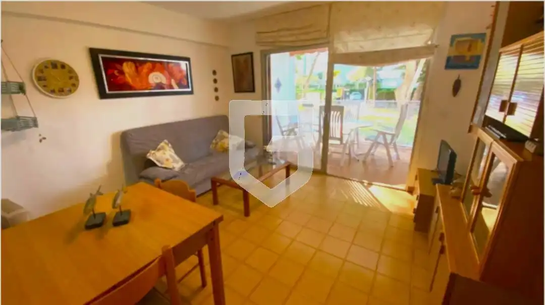 Sala d'estar de Pis en venda en Benicasim / Benicàssim amb Jardí privat, Terrassa i Piscina