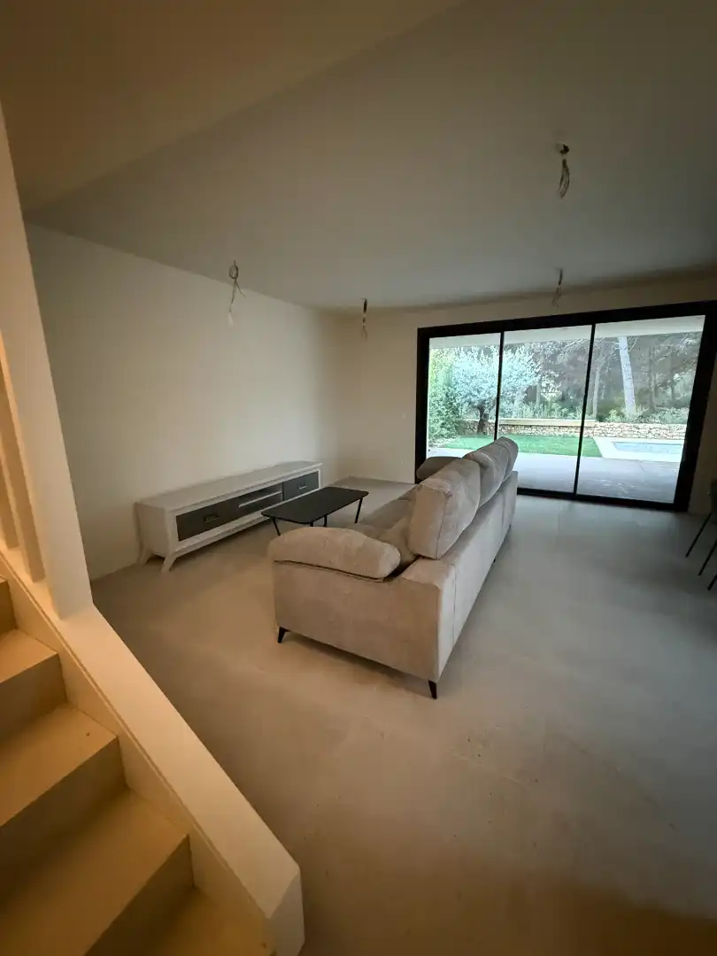 Sala d'estar de Casa adosada en venda en Salou amb Aire condicionat, Calefacció i Jardí privat