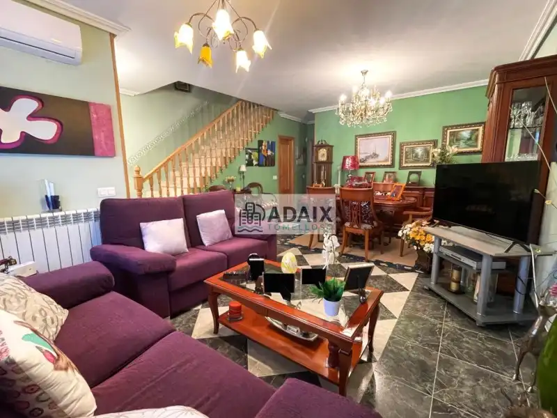 Sala d'estar de Casa adosada en venda en Tomelloso amb Aire condicionat, Calefacció i Balcó