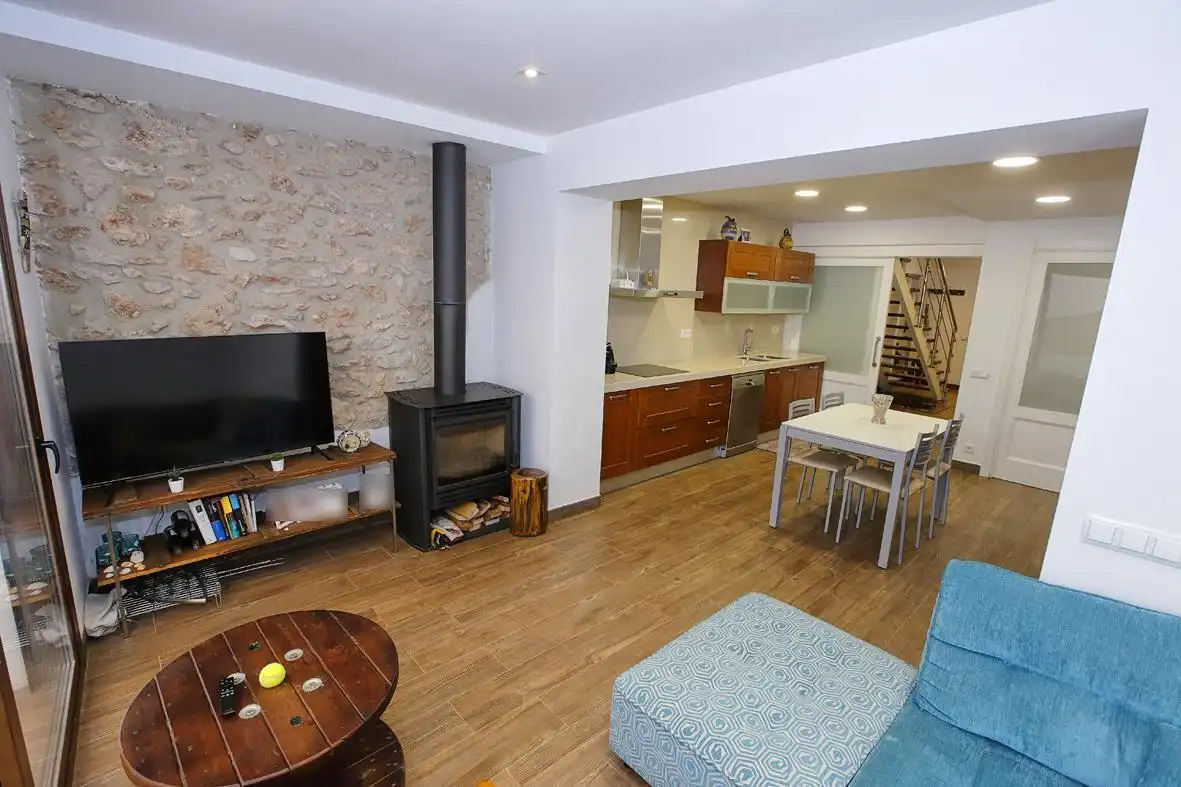 Sala de estar de Casa adosada en venta en Alcanar con Calefacción, Jardín privado y Terraza
