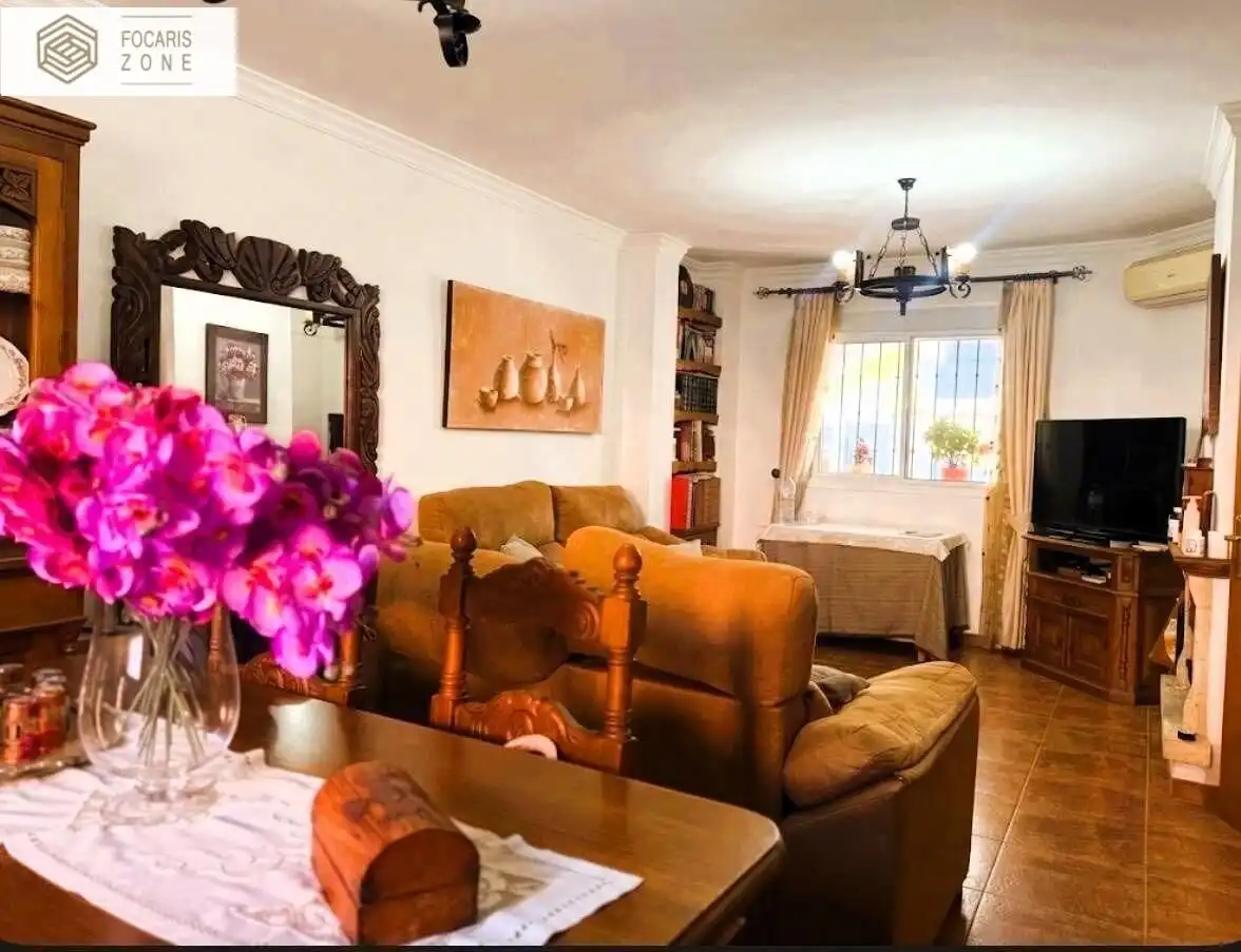 Sala de estar de Casa adosada en venta en Málaga con Aire acondicionado, Calefacción y Terraza