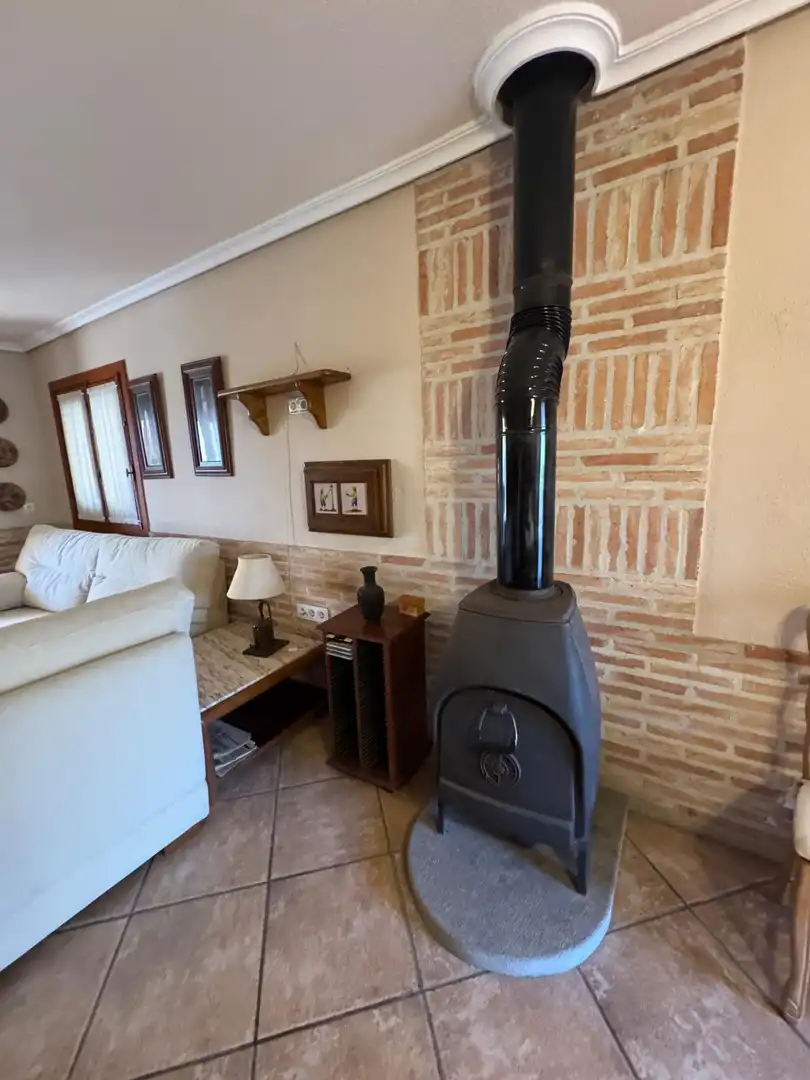 Sala d'estar de Casa o xalet de lloguer en Sagunto / Sagunt amb Aire condicionat, Jardí privat i Terrassa