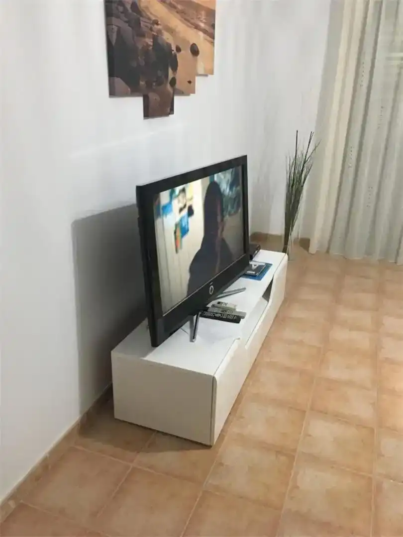 Sala d'estar de Casa adosada en venda en Arrecife amb Aire condicionat, Jardí privat i Traster