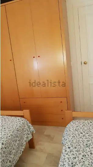 Dormitori de Pis de lloguer en Sevilla amb Aire condicionat, Terrassa i Moblat