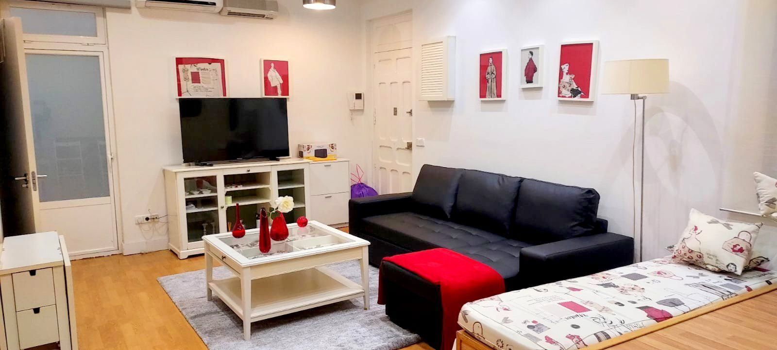 Sala d'estar de Loft de lloguer en  Madrid Capital amb Calefacció, Terrassa i Moblat
