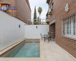 Swimming pool of Single-family semi-detached for sale in  Granada Capital  with Heating, Private garden and Terrace