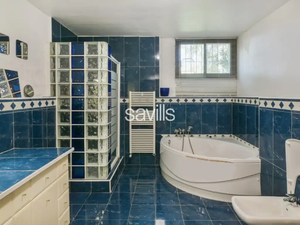 Bany de Casa o xalet en venda en Málaga
