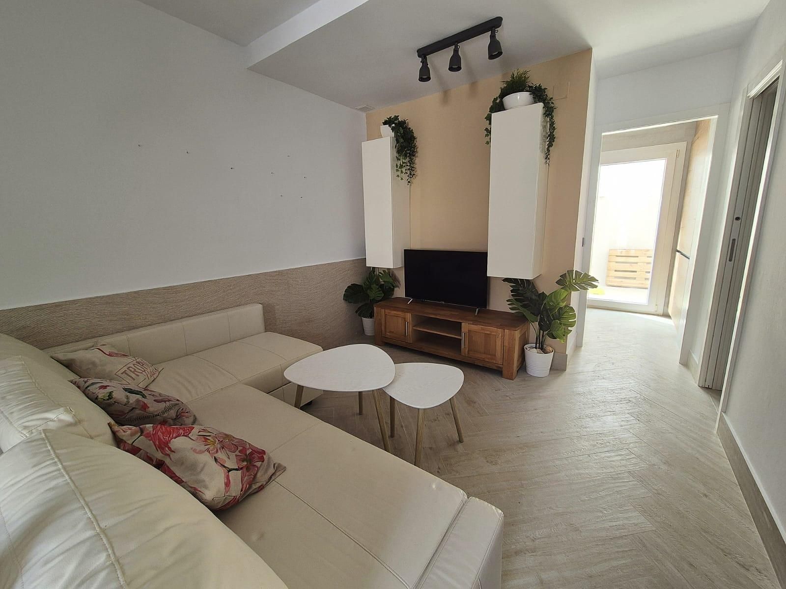 Sala d'estar de Casa adosada en venda en Oria amb Aire condicionat, Jardí privat i Terrassa