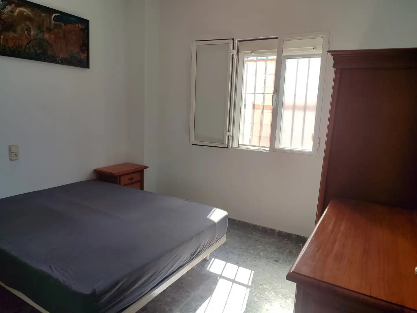 Dormitori de Casa o xalet de lloguer en Utrera amb Aire condicionat, Jardí privat i Terrassa