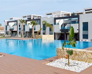 Swimming pool of Attic for sale in Torrevieja  with Air Conditioner, Private garden and Terrace
