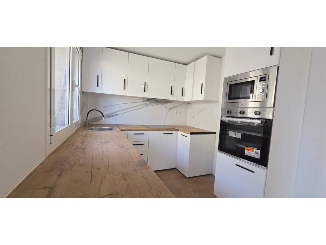 Kitchen of Attic for sale in Rubí  with Heating, Parquet flooring and Balcony